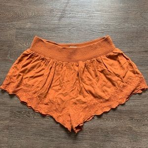 Orange flowy shorts